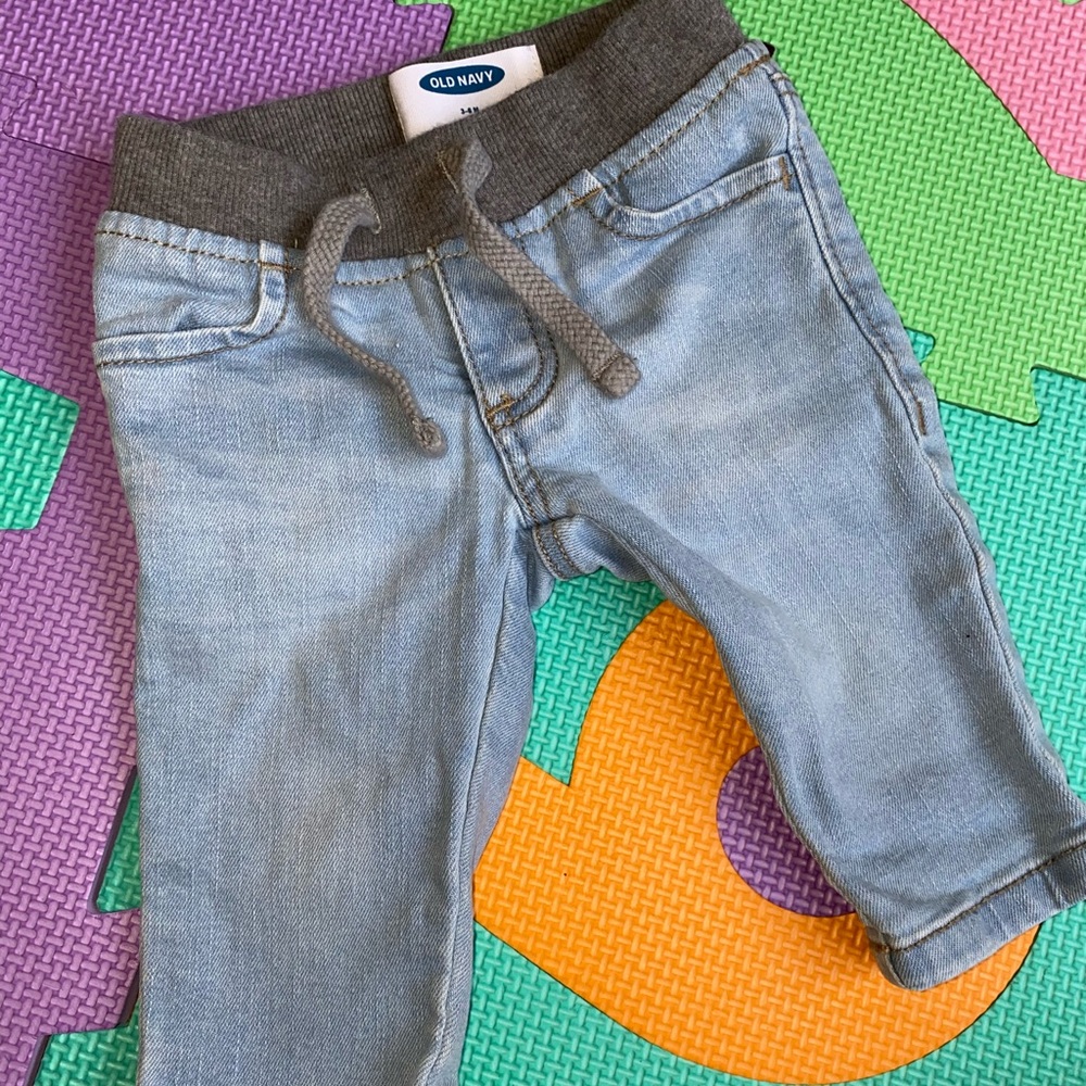 Light blue jeans with adjustable waistband